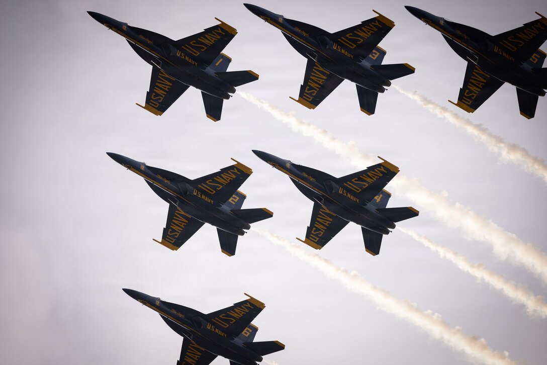 U.S. Navy F/A-18 Super Hornet aircraft with flight demonstration squadron, the Blue Angels, perform a fly-over at Marine Corps Support Facility New Orleans, Aug. 30, 2026. The Blue Angels performed this fly-over in celebration of 110th anniversary of the Marine Corps Reserve. (U.S. Marine Corps photo by Sgt. Emily De La Torre)