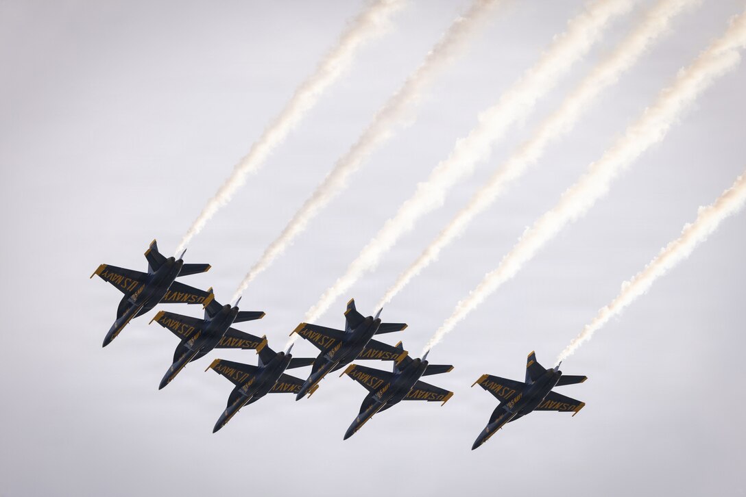 U.S. Navy F/A-18 Super Hornet aircraft with flight demonstration squadron, the Blue Angels, perform a fly-over at Marine Corps Support Facility New Orleans, Aug. 30, 2026. The Blue Angels performed this fly-over in celebration of 110th anniversary of the Marine Corps Reserve. (U.S. Marine Corps photo by Sgt. Emily De La Torre)