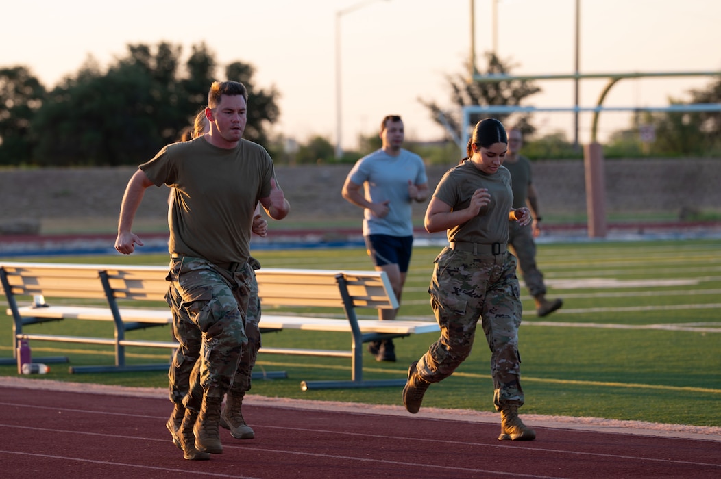 U.S. Airmen assigned to the 17th Comptroller Squadron participate in an Iron Ledger combat fitness test at Goodfellow Air Force Base, Texas, Aug. 19, 2026. T