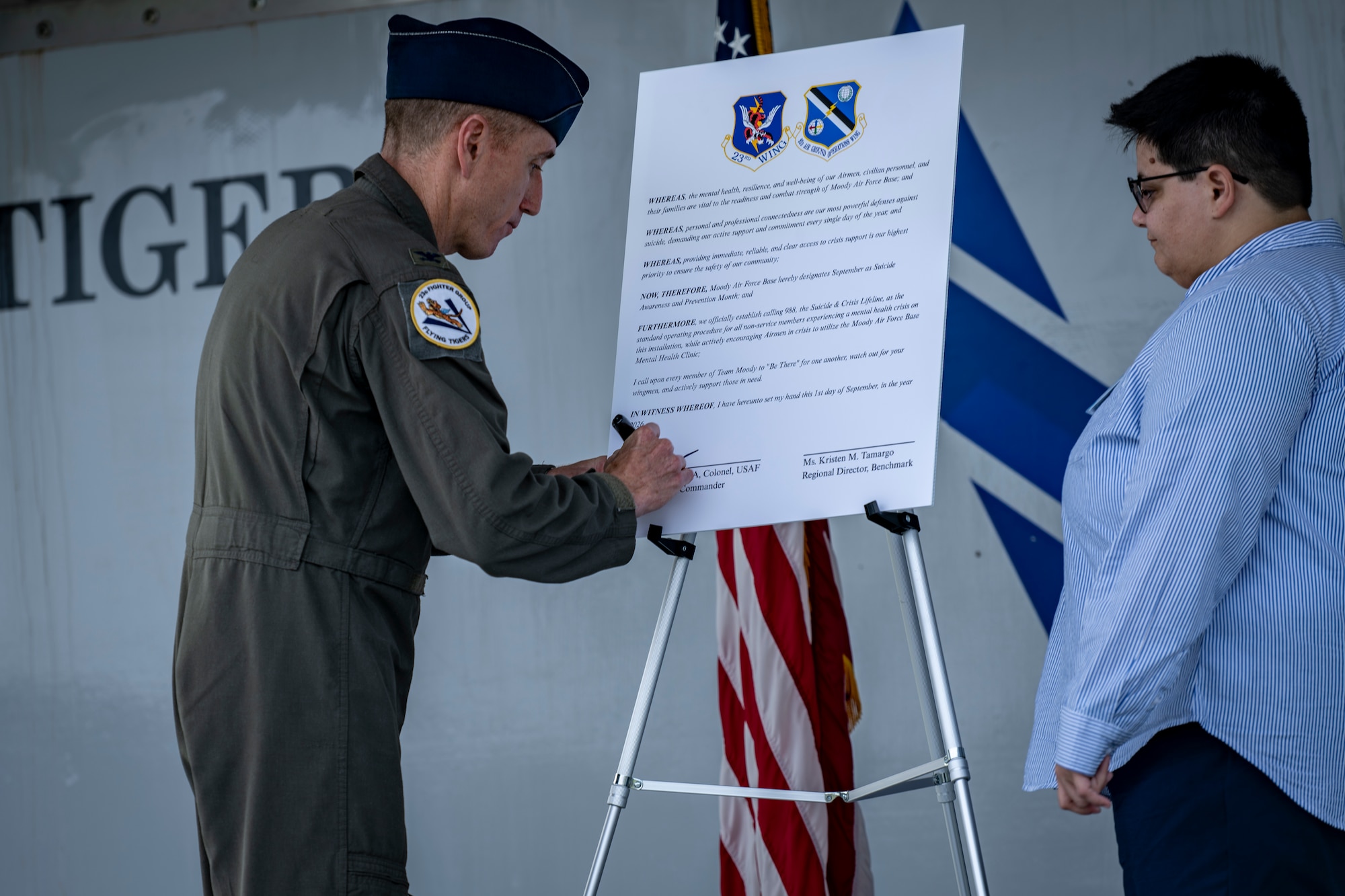 U.S. Air Force Colonel signing proclamation