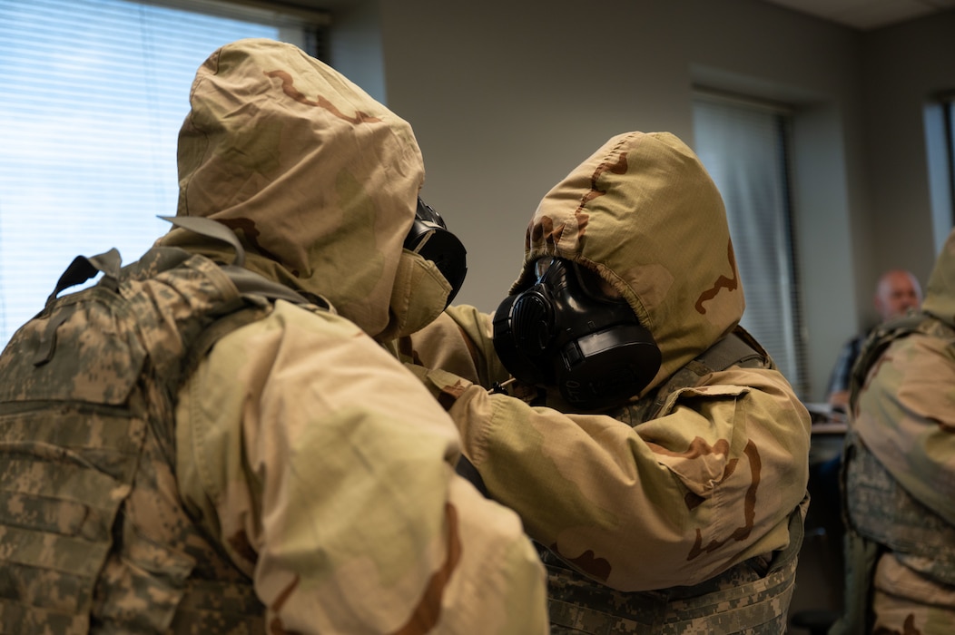 U.S. Airmen assigned to the 17th Comptroller Squadron perform buddy checks during a simulated deployment scenario at  Goodfellow Air Force Base, Texas, Aug. 19, 2026.