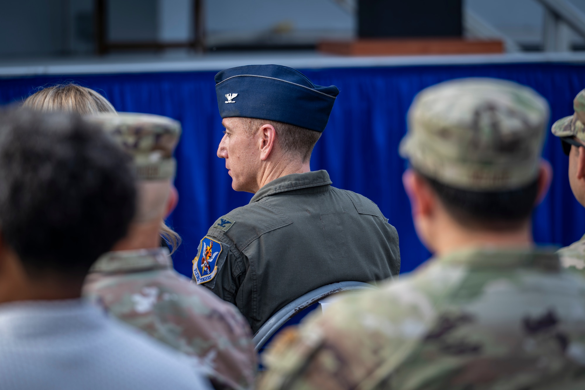 Air Force Colonel sitting at a ceremony