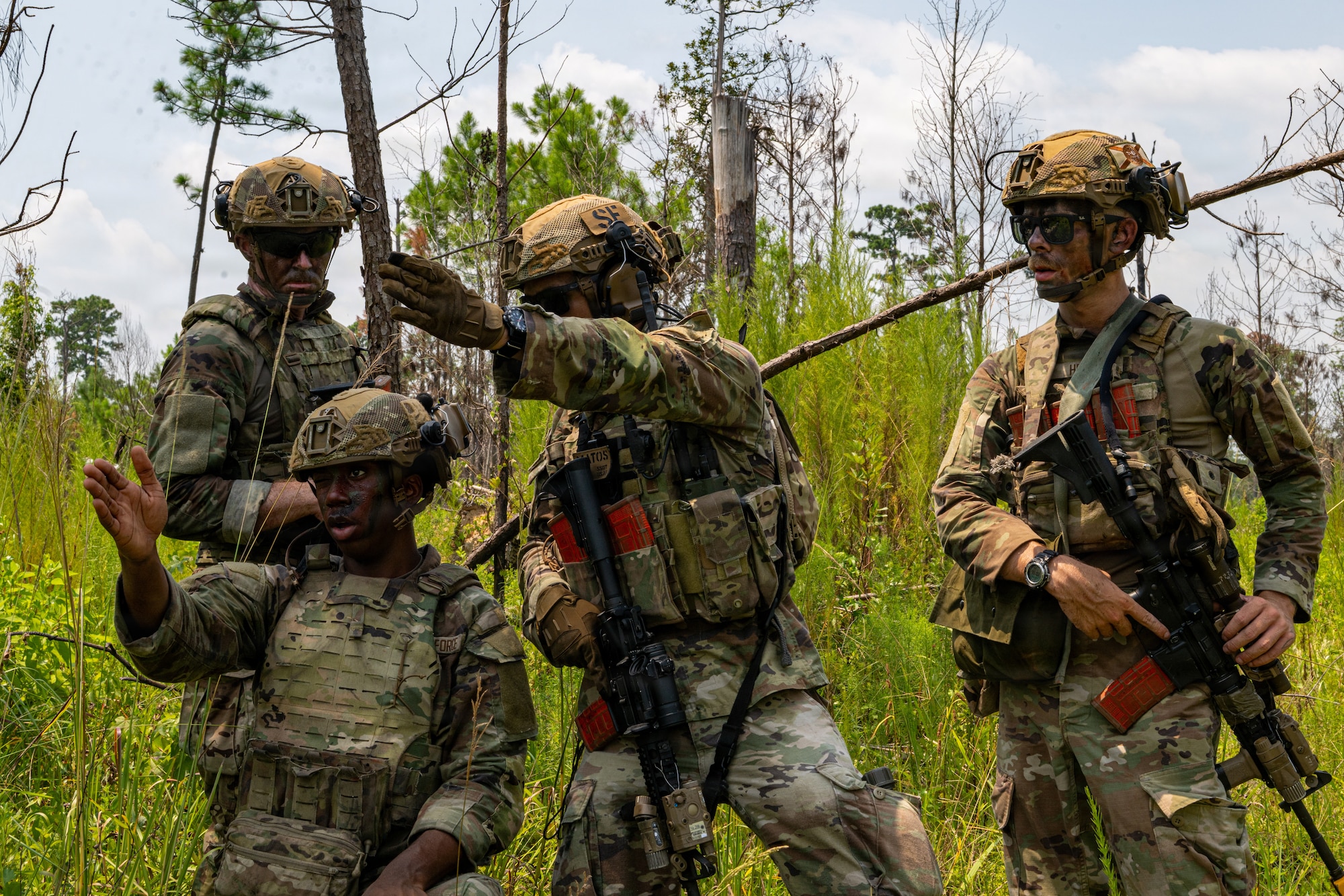 Airmen pointing.