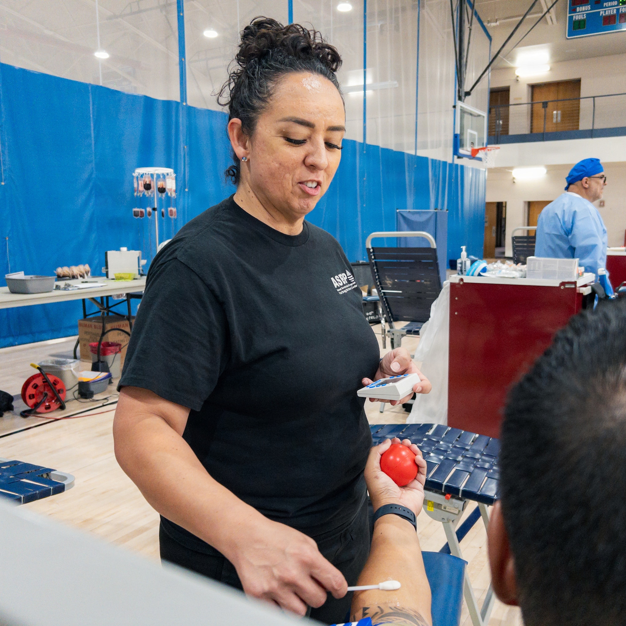 Alex Rodriguez, Armed Services Blood Program phlebotomist, prepares to take blood from a donor at Holloman Air Force Base, New Mexico, Aug. 27, 2026.