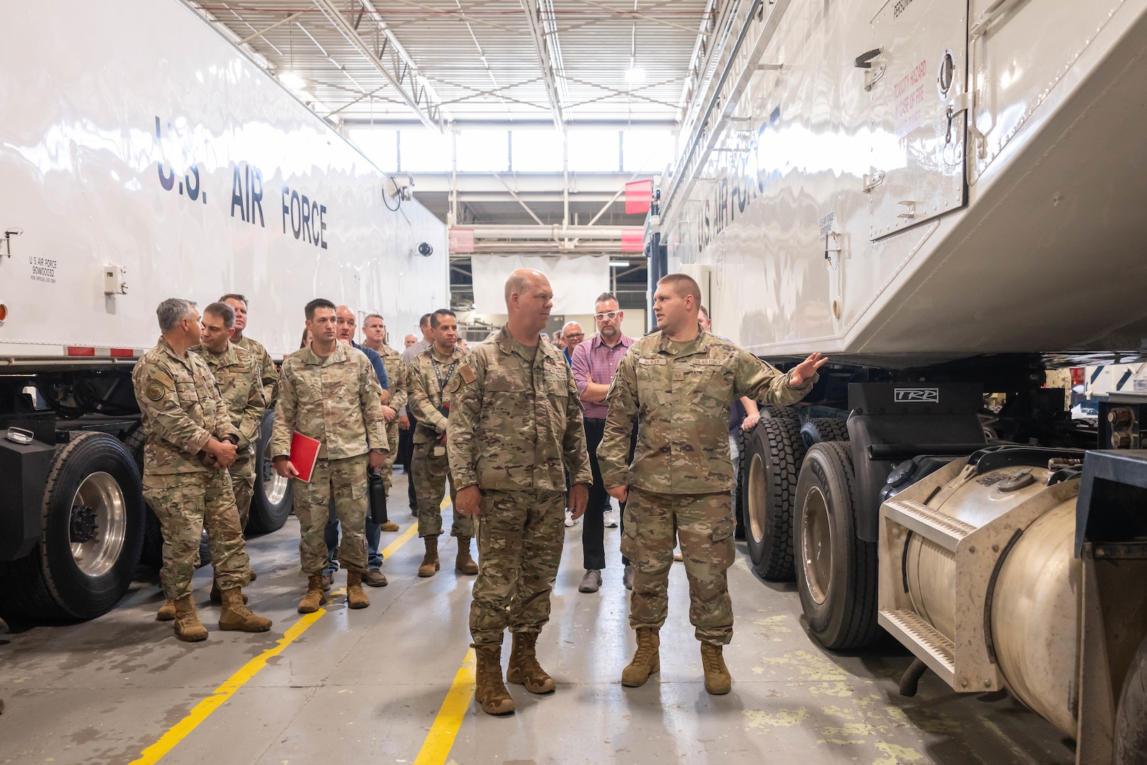 U.S. Air Force Master Sgt. Matthew Bickley, 581st Missile Maintenance Squadron ground systems section deputy flight chief, points out key updates to a Minuteman III transporter erector trailer to Gen. S.L. Davis, commander of Air Force Global Strike Command, during a visit at Hill Air Force Base, Utah, Aug. 3, 2026. The command’s leaders visited the installation and nearby Promontory during a two-day immersion that provided a direct look at the ongoing efforts to build and field the LGM-35A Sentinel intercontinental ballistic missile system. (U.S. Air Force photo by Cynthia Griggs)