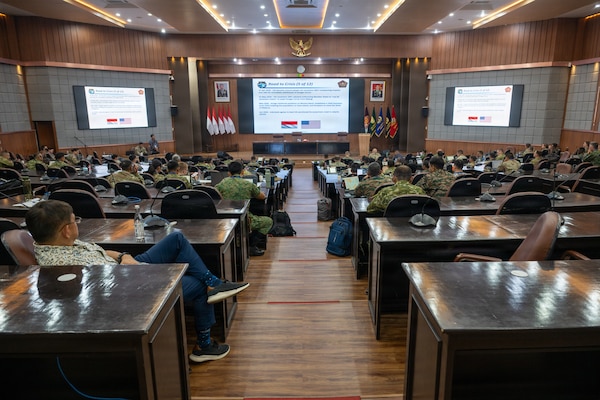 Multinational service members receive a scenario briefing during the first day of a staff exercise during Super Garuda Shield 26 held at the Indonesian Armed Forces Staff and Command School in Bandung, Indonesia, Aug. 31, 2026.