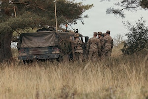 U.S. Soldiers from the 173rd Airborne Mobile Brigade Combat Team prepare for upcoming operations during exercise Saber Junction 26 at the Joint Multinational Readiness Center’s (JMRC) Hohenfels Training Area, Germany, Aug. 28, 2026. JMRC's combat training center rotations drive unrivaled innovation and readiness in the U.S. Army Europe and Africa area of operations. (U.S. Army photo by Pfc. Aubrey Boyle)