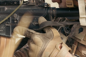 A U.S. Soldier from the 173rd Mobile Brigade Combat Team prepares to transition to semi-active operations in preparation for an attack during exercise Saber Junction 26 at the Joint Multinational Readiness Center’s (JMRC) Hohenfels Training Area, Germany, Aug. 28, 2026. JMRC's combat training center rotations drive unrivaled innovation and readiness in the U.S. Army Europe and Africa area of operations. (U.S. Photo by Spc. Aubrey Boyle)