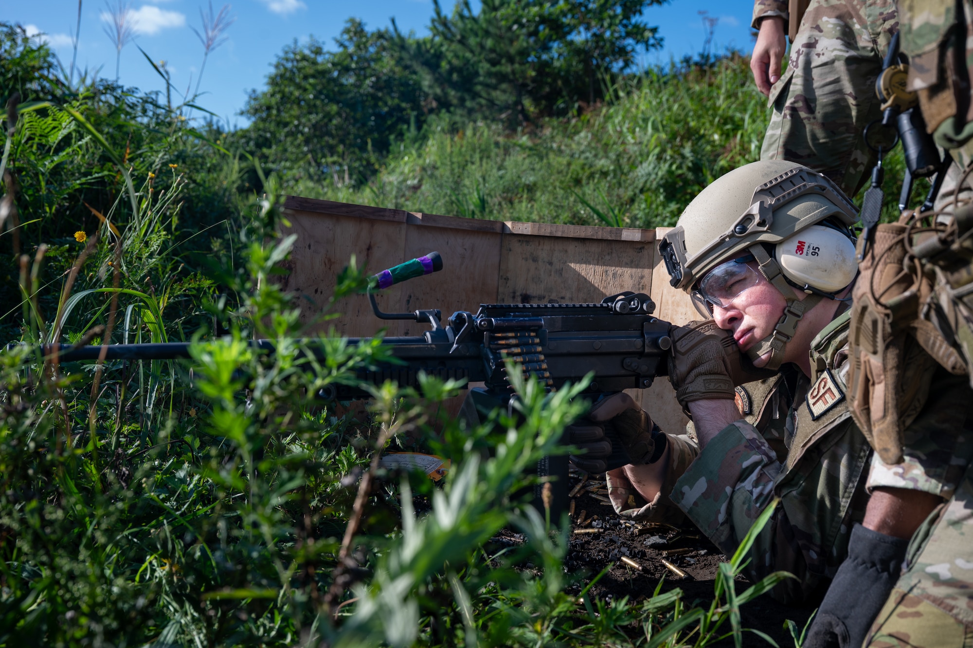 U.S. Air Force Airman 1st Class Matthew Martin, 35th Security Forces Squadron (SFS) response force member, fires an M249 squad automatic weapon during heavy weapons training at Misawa Air Base, Japan, Aug. 28, 2026. Heavy weapons training strengthens Airmen’s weapons proficiency and tactical capabilities, ensuring the 35th SFS remains prepared to defend Misawa Air Base and protect combat airpower supporting U.S. and allied operations across the Pacific. (U.S. Air Force photo by Airman 1st Class Angelica Winther)