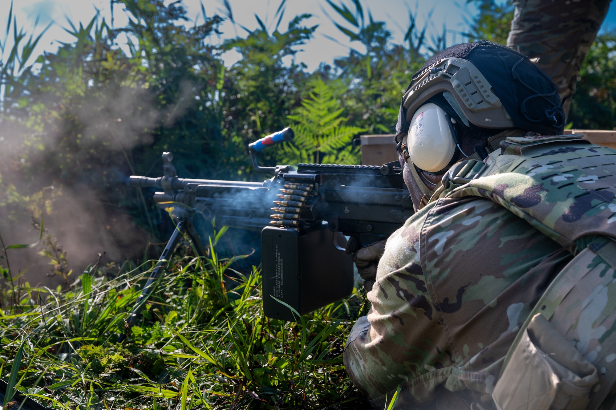 U.S. Air Force Staff Sgt. Jameson Gabriel, 35th Security Forces Squadron (SFS) Combat Arms Training and Maintenance instructor supervisor, fires an M249 squad automatic weapon during heavy weapons training at Misawa Air Base, Japan, Aug. 28, 2026. Training with advanced weapon systems builds the technical proficiency and combat capability 35th SFS Airmen need to provide effective installation defense and preserve the 35th Fighter Wing’s ability to generate combat airpower in the Pacific. (U.S. Air Force photo by Airman 1st Class Angelica Winther)