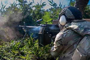 U.S. Air Force Staff Sgt. Jameson Gabriel, 35th Security Forces Squadron (SFS) Combat Arms Training and Maintenance instructor supervisor, fires an M249 squad automatic weapon during heavy weapons training at Misawa Air Base, Japan, Aug. 28, 2026. Training with advanced weapon systems builds the technical proficiency and combat capability 35th SFS Airmen need to provide effective installation defense and preserve the 35th Fighter Wing’s ability to generate combat airpower in the Pacific. (U.S. Air Force photo by Airman 1st Class Angelica Winther)