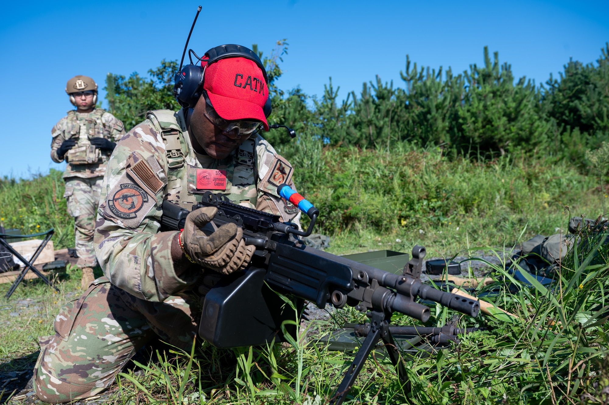U.S. Air Force Staff Sgt. Jameson Gabriel, 35th Security Forces Squadron (SFS) Combat Arms Training and Maintenance instructor supervisor, handles an M249 squad automatic weapon during heavy weapons training at Misawa Air Base, Japan, Aug. 28, 2026. Through recurring weapons training, 35th SFS Airmen maintain the proficiency required to defend the installation against ground threats and protect the personnel, aircraft and infrastructure critical to mission execution. A capable and ready security force helps preserve Misawa’s operational readiness, enabling the 35th Fighter Wing to generate combat power and support U.S. Forces Japan and U.S. Pacific Command operations. (U.S. Air Force photo by Airman 1st Class Angelica Winther)