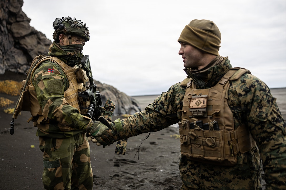 U.S. Marines test communications equipment in Jan Mayen, Norway, Sept. 1, 2026. The communications verification, conducted during Operation Atlantic City 26, ensured secure and resilient command and control links across dispersed units, reinforcing NATO's ability to coordinate operations across austere Arctic terrain. Atlantic City 26 is a Norwegian-led trilateral readiness initiative with the United Kingdom and United States designed to develop and demonstrate expeditionary advanced base capabilities and validate combined fires, maritime domain awareness, and sea denial to reinforce the security and stability of the High North. Jan Mayen is sovereign Norwegian territory in an isolated part of the Norwegian Sea, approximately 1,000 kilometers (620 miles) from mainland Norway. At the same time, the island occupies an important geostrategic position north of the Greenland-Iceland-U.K. gap, an area of water strategically significant to the defense of the U.S. homeland and northern Europe. (U.S. Marine Corps photo by Sgt. Noah Masog)
