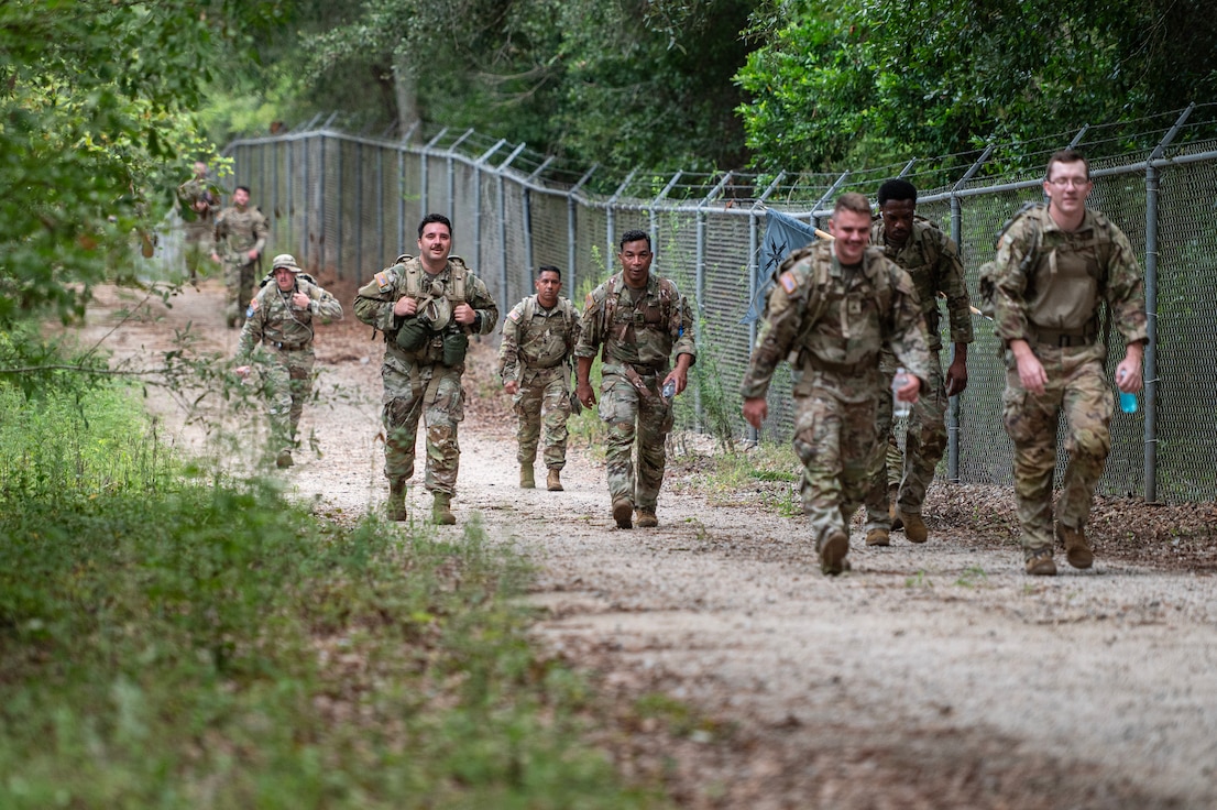 soldiers ruck marching