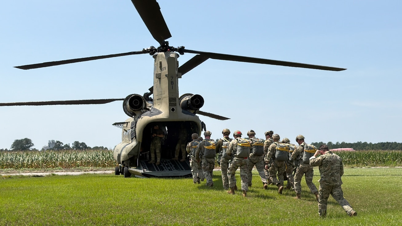 parachute training loading up on a helicopter