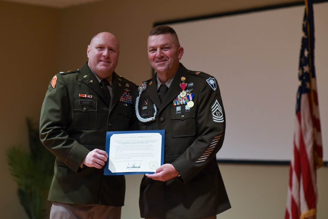 retirement ceremony holding award