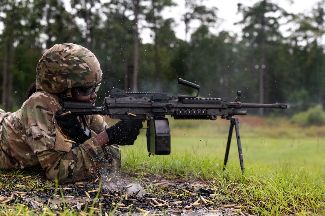 soldier firing weapon at annual training