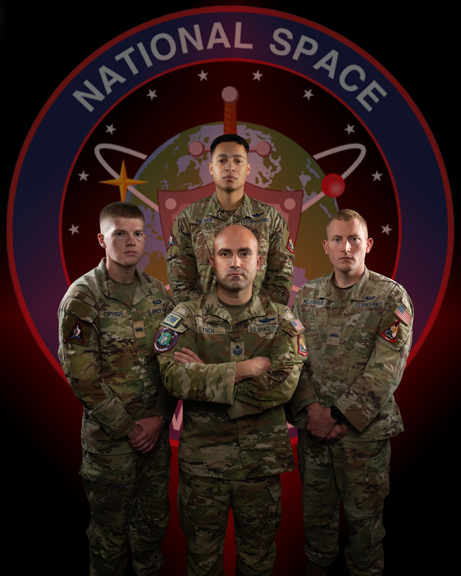 Tech. Sgt. Caleb Lynch, Sgt. David Palmer, Spc. 4 Jesse Coppedge and Spc. 4 William McLaughlin pose for a group photo