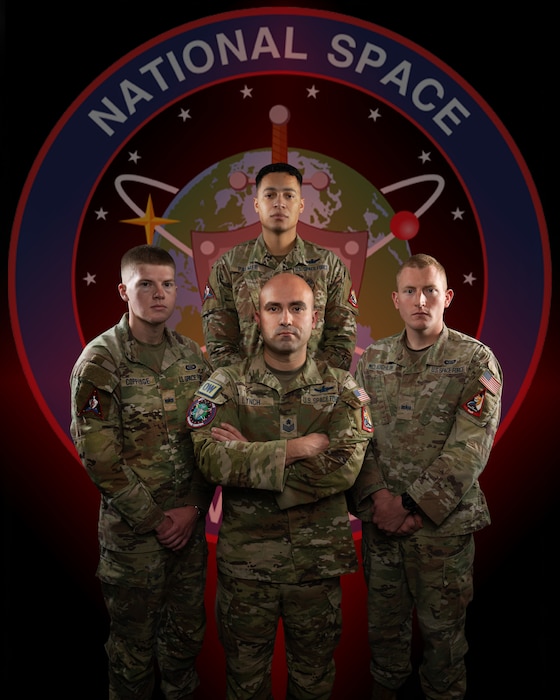 Tech. Sgt. Caleb Lynch, Sgt. David Palmer, Spc. 4 Jesse Coppedge and Spc. 4 William McLaughlin pose for a group photo