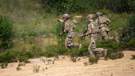 U.S. Air Force Security Forces Airmen with the Air National Guard, shoot, move and communicate toward a mission objective during exercise Sage Eagle 26-4, on Camp Grayling, Michigan, Aug. 11, 2026.