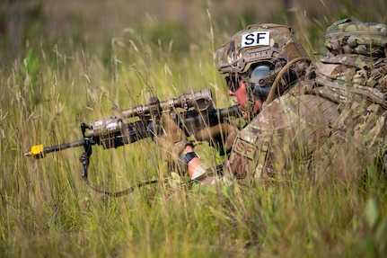 A U.S. Air Force Security Forces Airman with the Air National Guard, moves toward a mission objective during exercise Sage Eagle 26-4, on Camp Grayling, Michigan, Aug. 11, 2026.