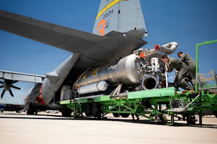 U.S. Air Force loadmasters assigned to the 153rd Airlift Wing guide a Modular Airborne Firefighting System, known as MAFFS, into the cargo bay of a C-130 Hercules at the 153rd Airlift Wing, Wyoming Air National Guard Base, in Cheyenne, Wyoming, July 13, 2026.