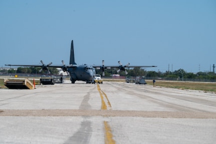 A U.S. Air Force C-130H Hercules taxis to a parking spot at Kelly Field, Joint Base San Antonio-Lackland, Texas, Aug. 24, 2026. This aircraft is scheduled to be retired and serve as a dedicated training platform for Basic Military Training NEXT, giving trainees a more realistic view of the airfield environment and the operational Air Force. (U.S. Air Force photo by Kristian Carter)