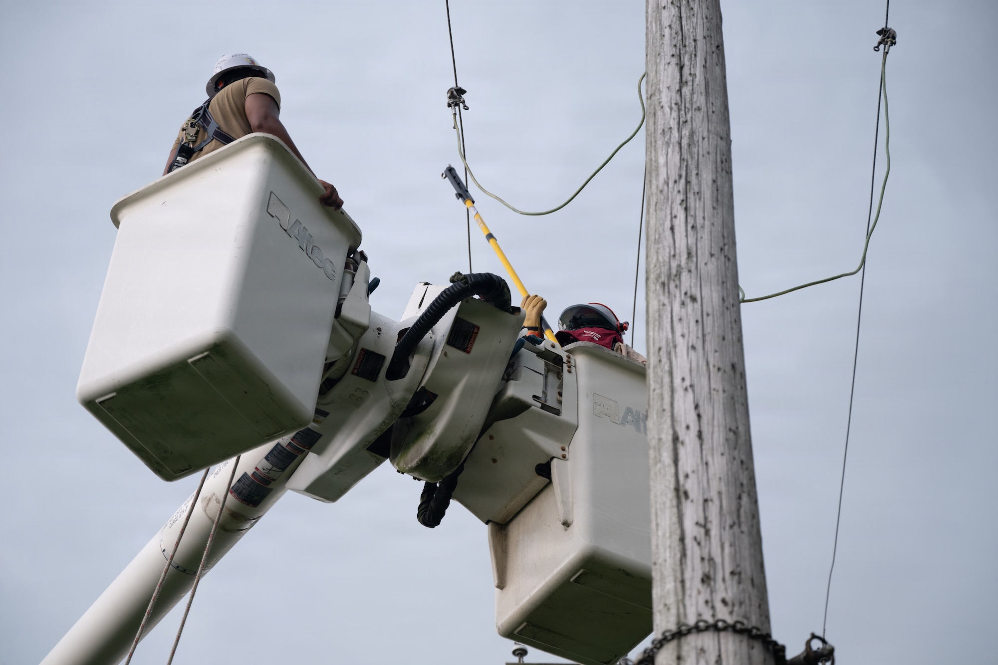 U.S. Air Force Airmen assigned to the 87th Civil Engineer Squadron perform maintenance on simulated telephone poles during the 87th Civil Engineer Group Prime Beef readiness training at Joint Base McGuire-Dix-Lakehurst, N.J., Aug. 20, 2026.