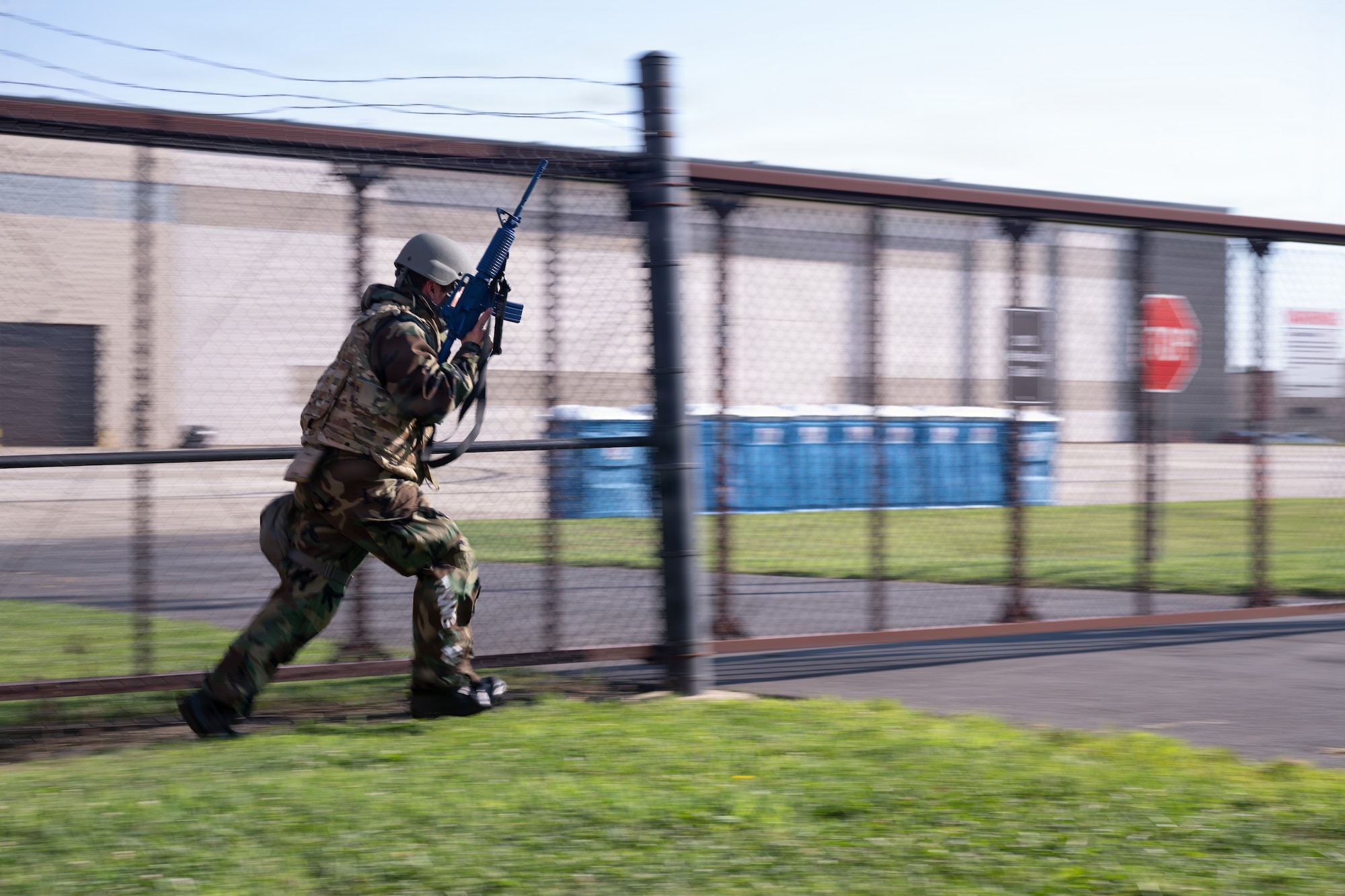 U.S. Air Force Airman 1st Class Miguel Oramas, 787th Civil Engineer Squadron engineer apprentice, sprints to a defensive fighting position during 87th Civil Engineer Group readiness training at Joint Base McGuire-Dix-Lakehurst, N.J., Aug. 20, 2026.