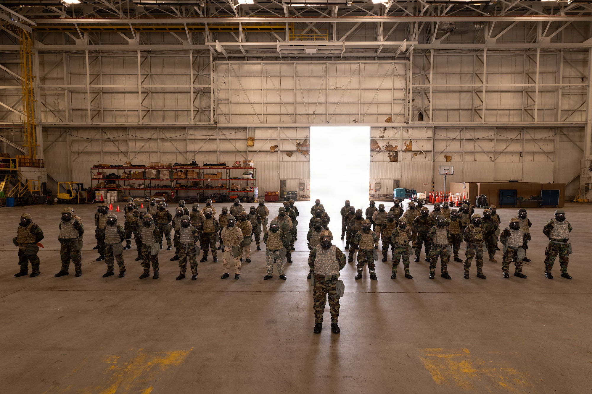 U.S. Air Force Airmen assigned to the 87th Civil Engineer Group stand in a mission oriented protective posture equipment formation during the 87th CEG Prime Beef readiness training at Joint Base McGuire-Dix-Lakehurst, N.J., Aug. 20, 2026.