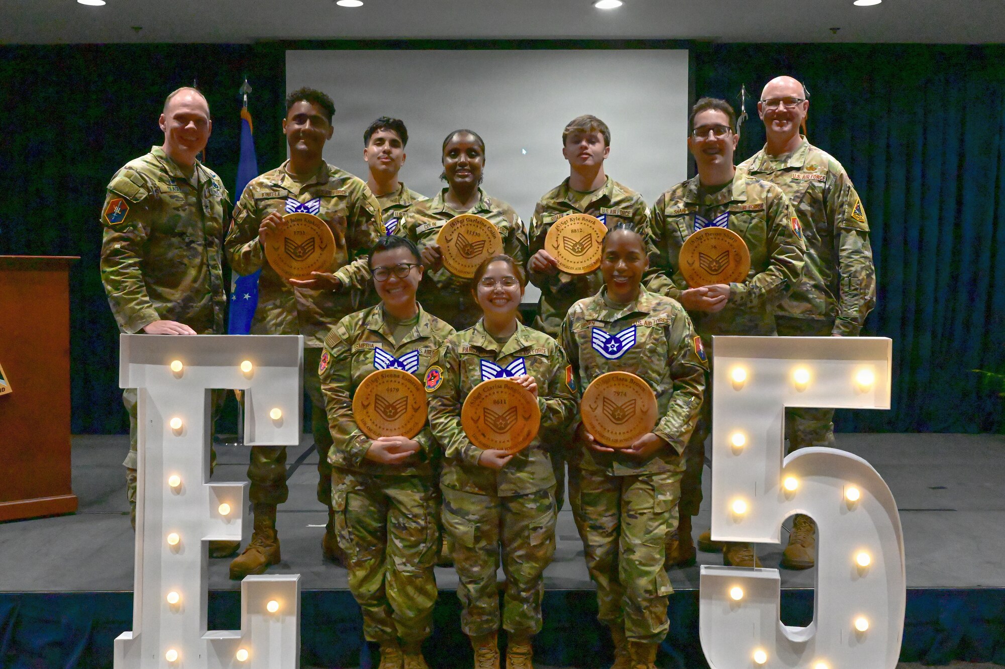 The event celebrated Airmen for their selection to the rank of staff sergeant (E-5), marking their welcome into the Noncommissioned Officer corps. In accordance with Air Force enlisted force structure, the transition to staff sergeant reflects an increased standard of technical competence, operational leadership, and direct supervision over junior Airmen.