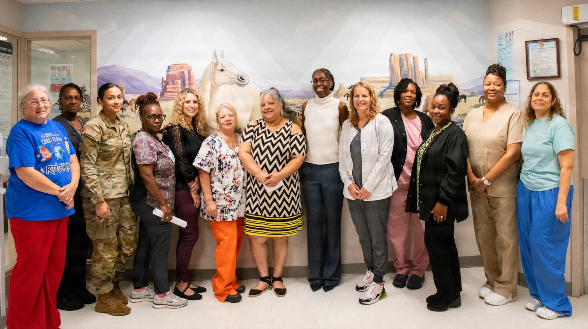 The pediatrics team takes a group picture together.