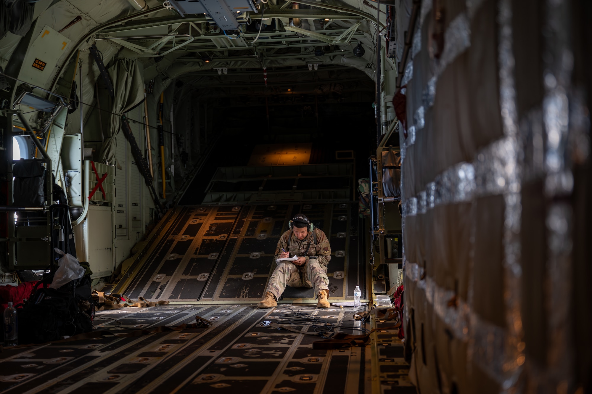 Loadmaster reviews procedures.
