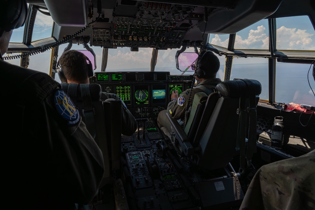 People pilot an aircraft.