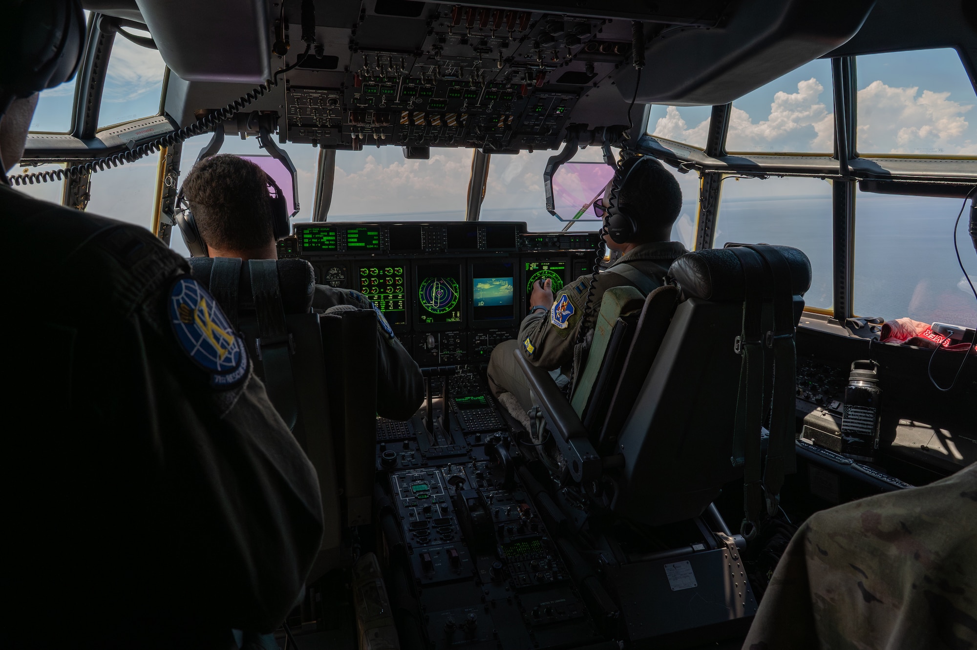People pilot an aircraft.