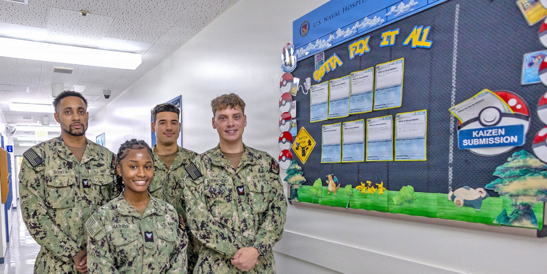 YOKOSUKA, Japan (June 17, 2026) — Sailors assigned to the U.S. Naval Hospital Yokosuka Dental Department pose with their Kaizen board. From left, Hospital Corpsman 3rd Class Bowen, Hospital Corpsman 3rd Class Harris, Hospitalman Ruiz and Hospital Corpsman 3rd Class Schwander earned first place in USNMRTC Yokosuka’s “Most Creative Kaizen Board” competition. Hospital Corpsman 2nd Class Cedillos and Hospitalman Willis are not pictured. (U.S. Navy photo by Daniel Taylor, USNMRTC Yokosuka Public Affairs)