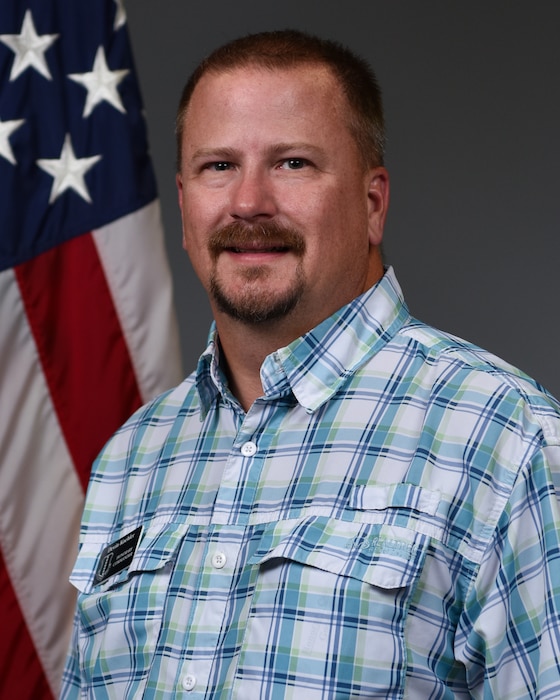 Devin Koehler, 17th Training Wing honorary commander, poses for a simulated official studio portrait during a Wing Staff Agencies immersion at Goodfellow Air Force Base, Texas, Aug. 28, 2026. The 17th TRW Public Affairs office provides wing personnel with official studio portraits, government passports and isolated personnel report photography services. (U.S. Air Force photo by Senior Airman Brian Lummus)
