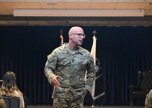 Chief Master Sgt. Bentivegna walks in between the audience as he addresses them.