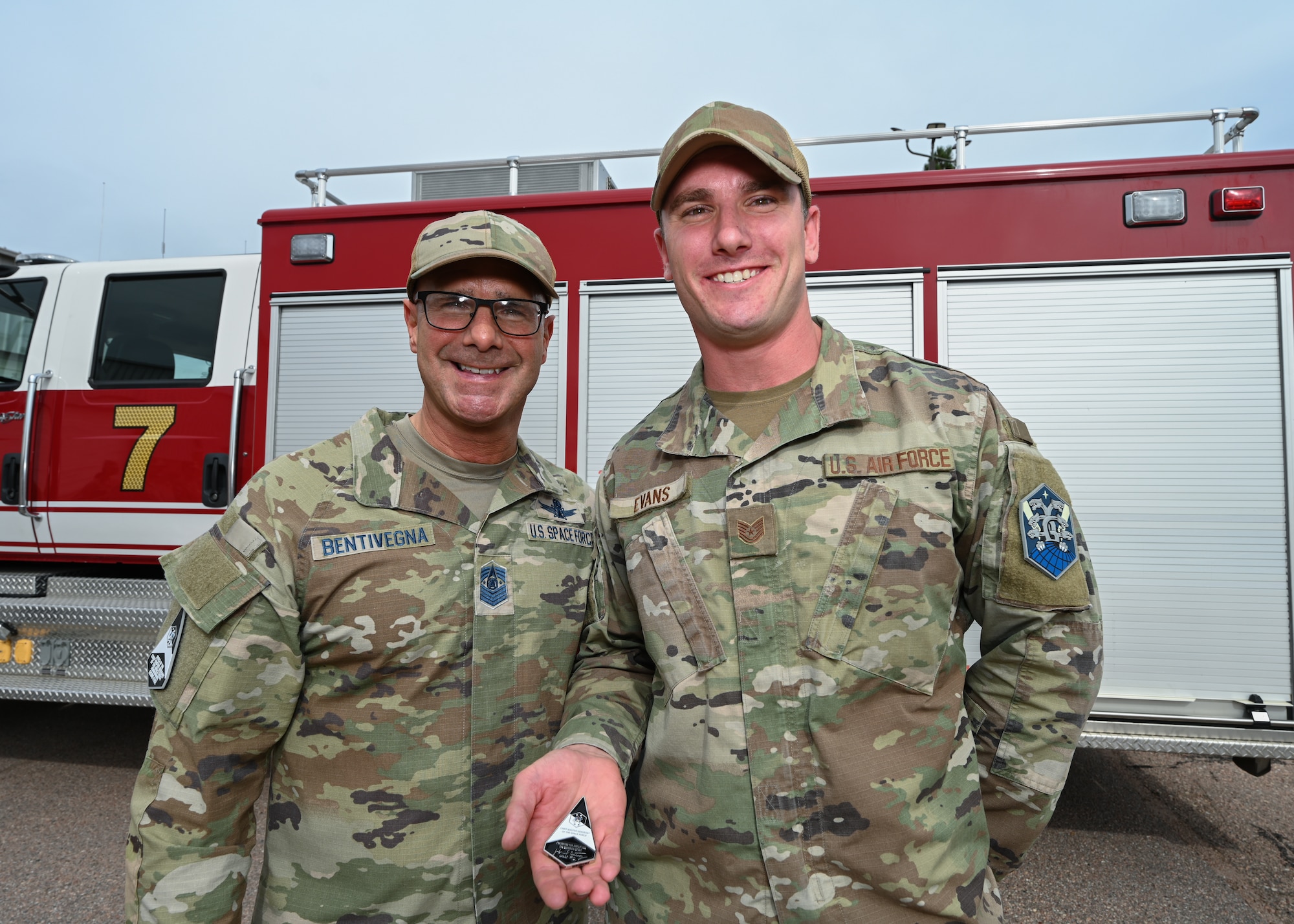 Both Chief Master Sgt. Bentivegna and Tech. Sgt. Evan pose for a photo.