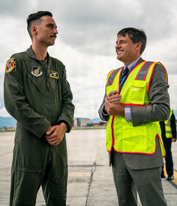 U.S. Air Force Maj. Preston Edwards, a pilot assigned to the 36th Airlift Squadron, speaks with U.S. Embassy Nepal Chargé d’Affaires Scott Urbom at Tribhuvan International Airport, Nepal, Sept. 2, 2026, following the delivery of life-saving supplies.