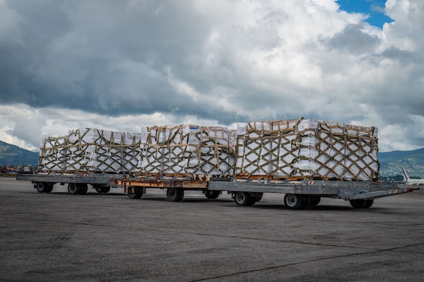 Palletized life-saving supplies sit on the flight line at Tribhuvan International Airport, Nepal, Sept. 2, 2026, after being delivered by the 374th Airlift Wing.