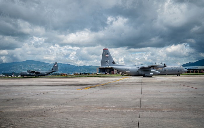 One U.S. Air Force C-130J Super Hercules, assigned to the 36th Airlift Squadron, Yokota Air Base, Japan, arrives on the flight line, as the other departs Tribhuvan International Airport, Nepal, Sept. 2, 2026, after delivering life-saving aid and supplies.
