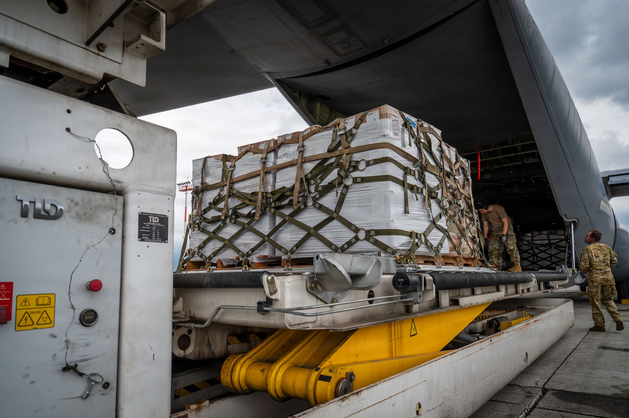 Palletized life-saving equipment is offloaded from a U.S. Air Force C-130J Super Hercules at Tribhuvan International Airport, Nepal, Sept. 2, 2026.