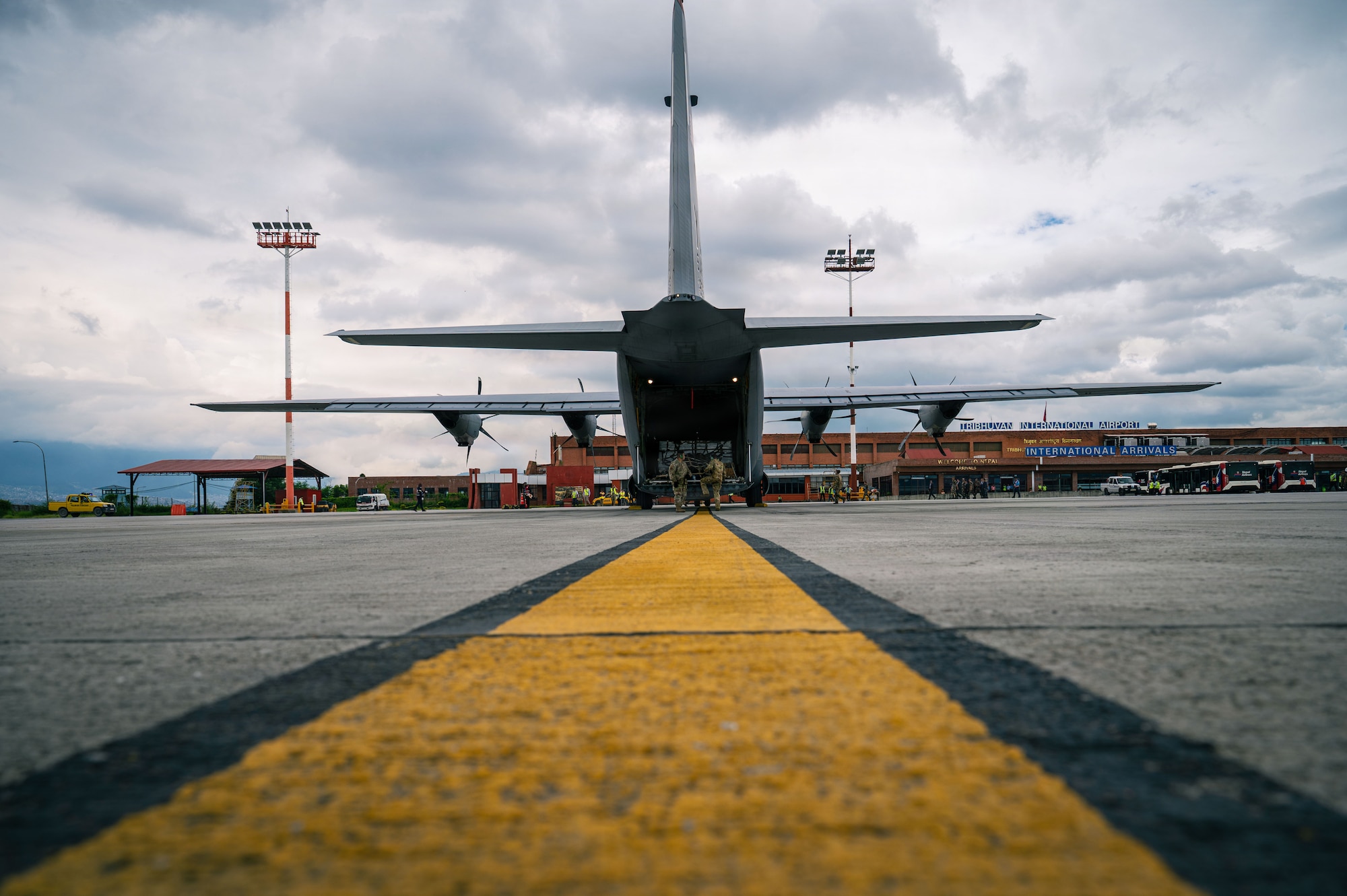 A U.S. Air Force C-130J Super Hercules, assigned to the 36th Airlift Squadron, Yokota Air Base, Japan, sits on the flight line at Tribhuvan International Airport, Nepal, Sept. 2, 2026, after delivering life-saving aid and supplies.