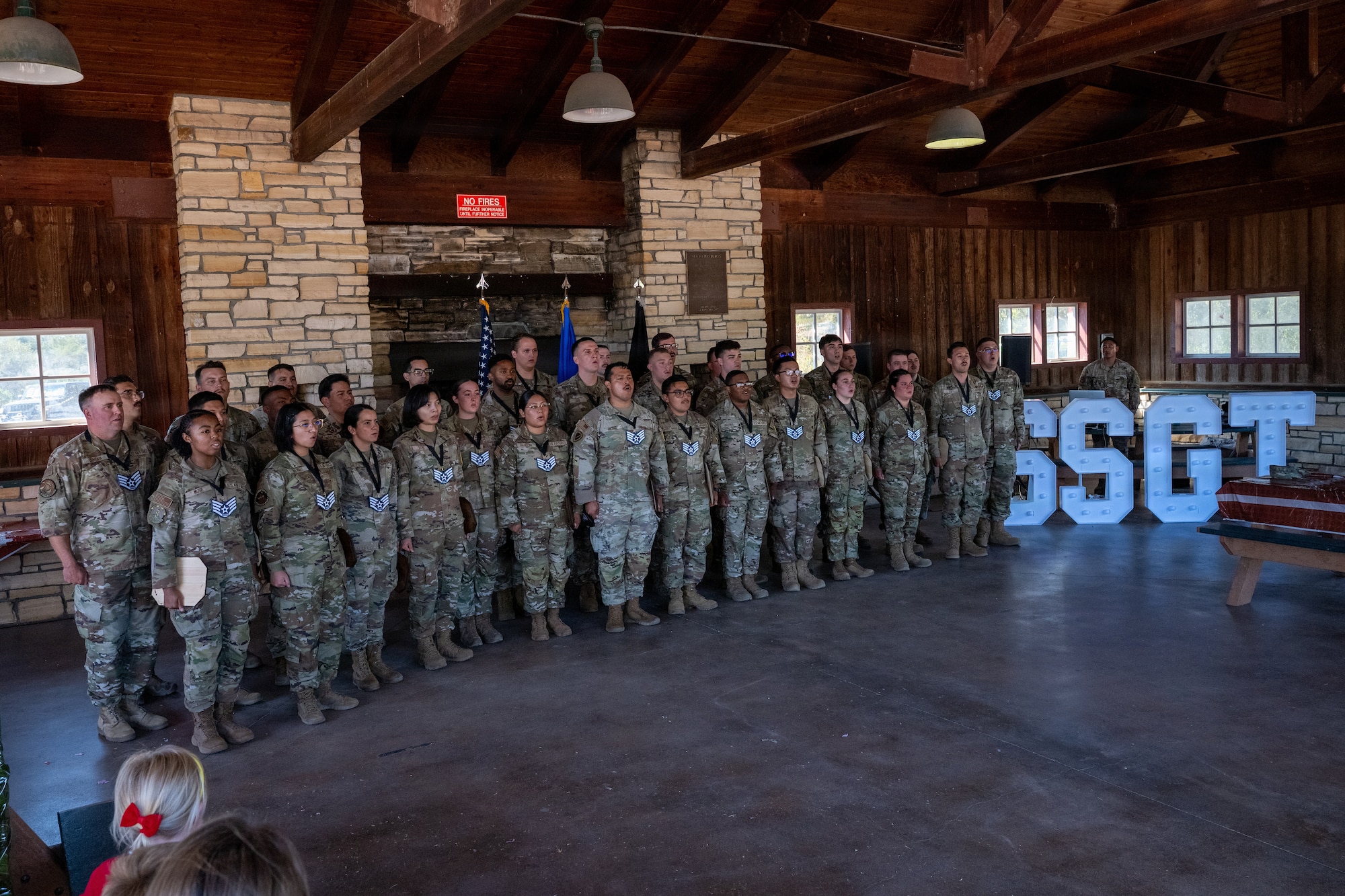 A group sing in a row.