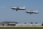 U.S. Air Force T-6 Texan II's from the 559th Flying Training Squadron takeoff on August 1, 2024, at Joint Base San Antonio-Randolph, Texas.