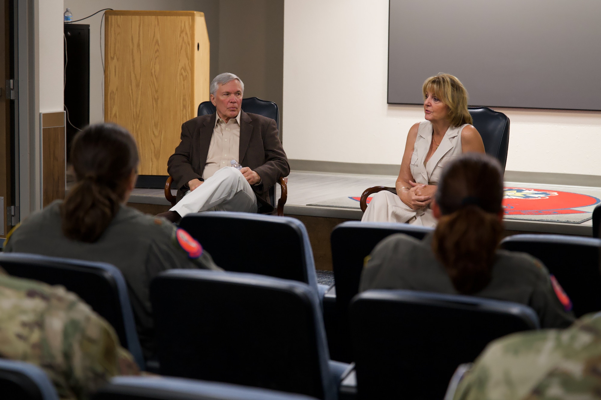 U.S. Air Force Maj. Gen. Margaret H. Woodward, retired, and U.S. Air Force Brig. Gen. Daniel P. Woodward, retired, speak at a mentorship meeting at Altus Air Force Base, Oklahoma, Aug. 31, 2026. Airmen who attended had the opportunity to ask questions about the generals’ unique careers and personal challenges. (U.S. Air Force photo by Airman Elijah Likowski)