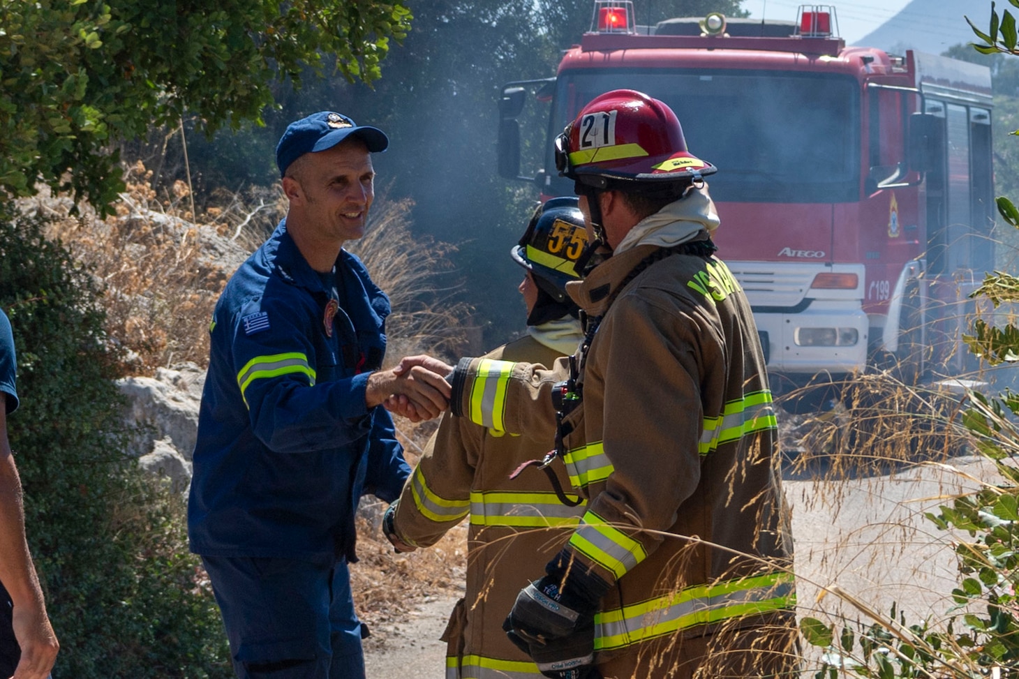 Firefighters from Naval Support Activity (NSA) Souda Bay Fire & Emergency Services and the host-nation Chania Fire Department respond to a brush fire near the installation in Mouzouras, Crete, Greece, Sept. 1, 2026.