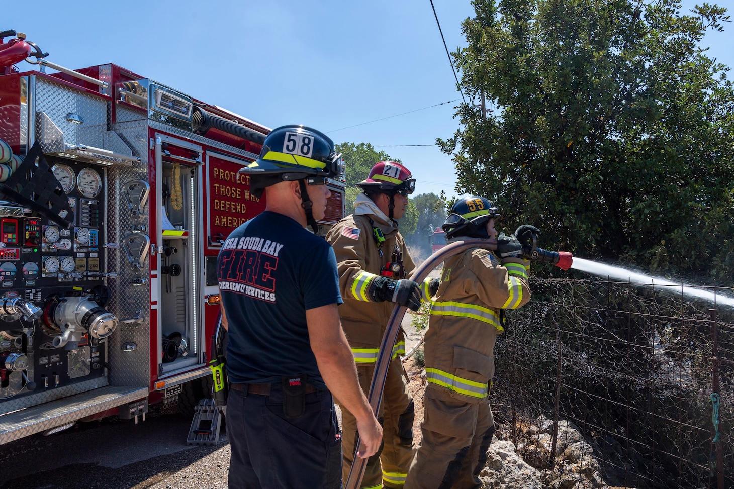 Firefighters from Naval Support Activity (NSA) Souda Bay Fire & Emergency Services and the host-nation Chania Fire Department respond to a brush fire near the installation in Mouzouras, Crete, Greece, Sept. 1, 2026.