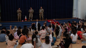U.S. Space Force Spc. 3 Jazmine Palafox (left), 73rd Intelligence Squadron Detachment 2 signals analyst, answers questions from students attending Osan Elementary School during a STEM for Space event at Osan Air Base, Republic of Korea, Sept. 2, 2026. The Q&A session gave students an opportunity to learn about space operations and explore potential careers in science, technology, engineering and mathematics. (U.S. Air Force photo by Senior Airman Megan Cusmano)